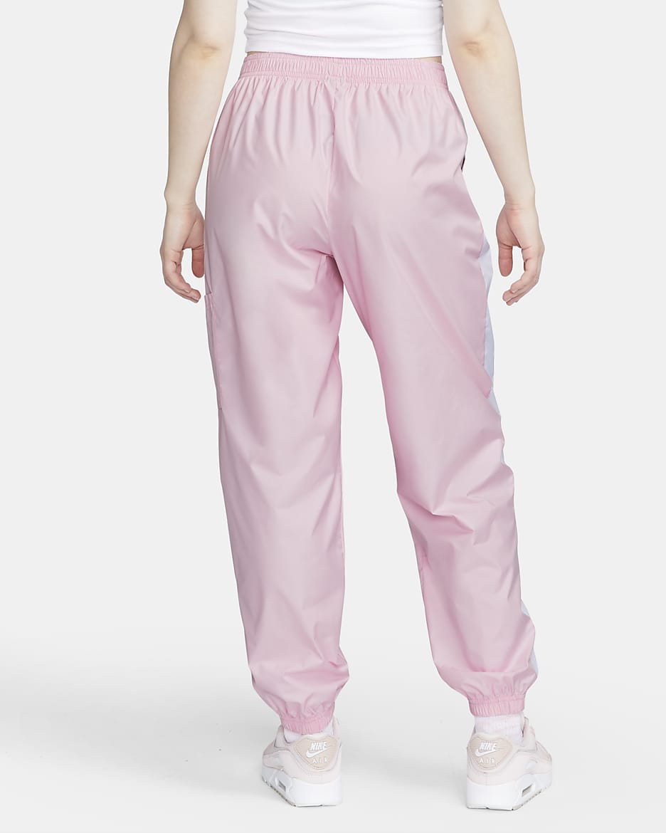 Nike woven track pants womens sale